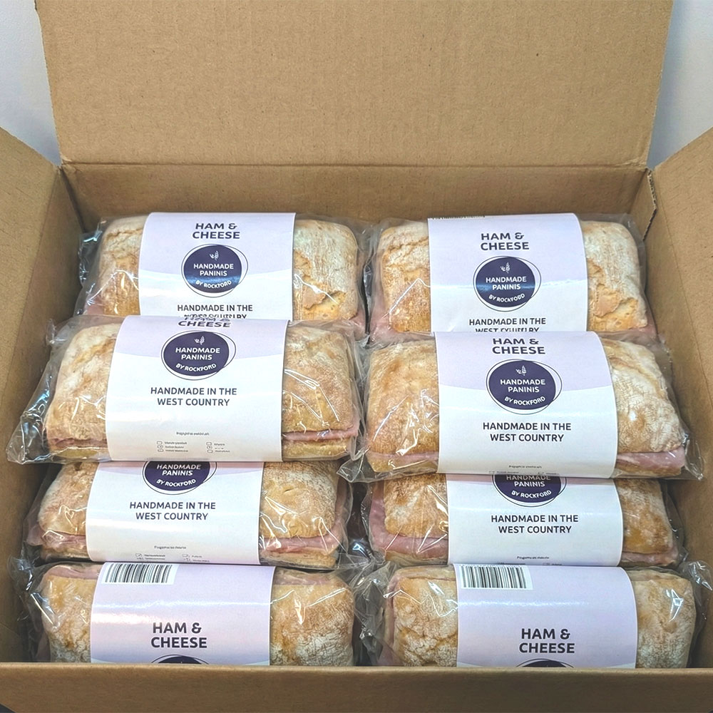 Hand-and-cheese-paninis-in-box