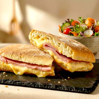 Rockford Ham and Cheese Paninis with a garden salad in the background